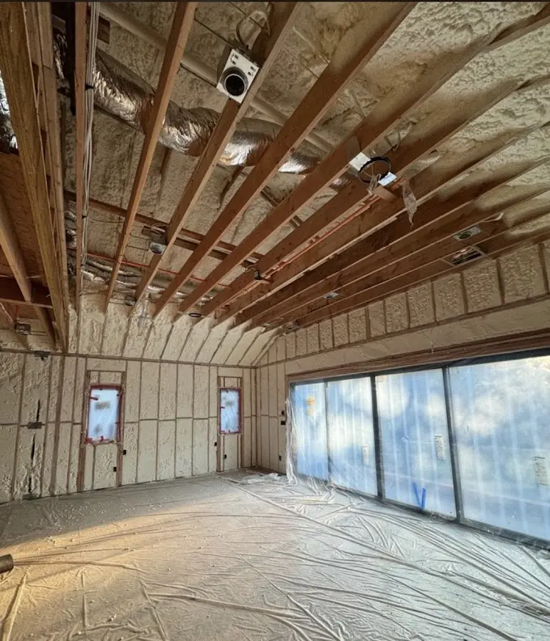 Interior walls and ceiling insulated with spray foam during new construction in Glen Allen