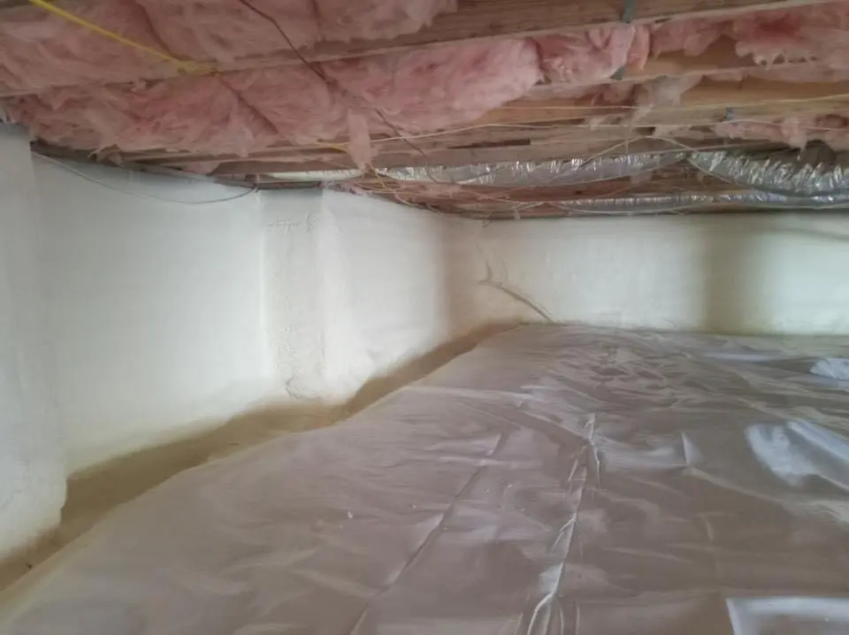 Crawl space encapsulation with closed-cell spray foam for Commercial Roof Restoration in Glen Allen